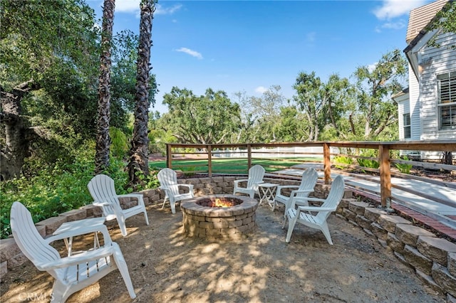 view of patio featuring an outdoor fire pit