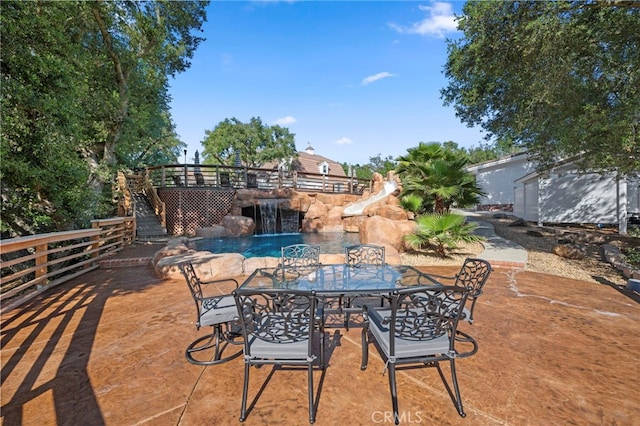 view of patio featuring outdoor dining area