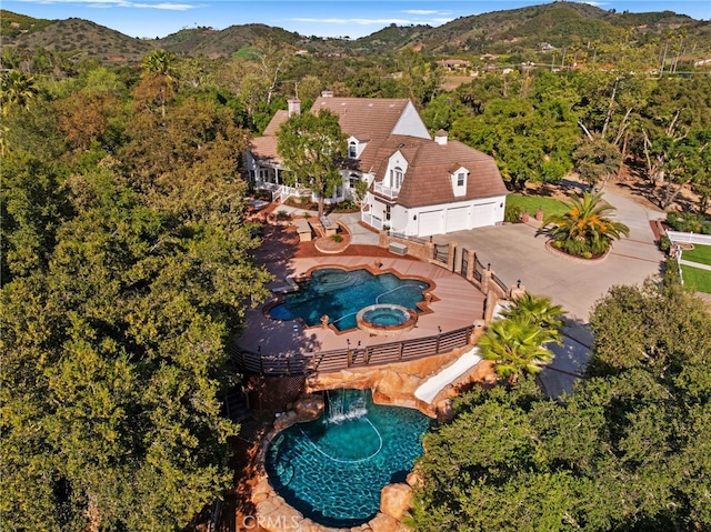 45325 Via Vaquero, Temecula, CA 92590 - view of subject property featuring a mountain backdrop and a pool
