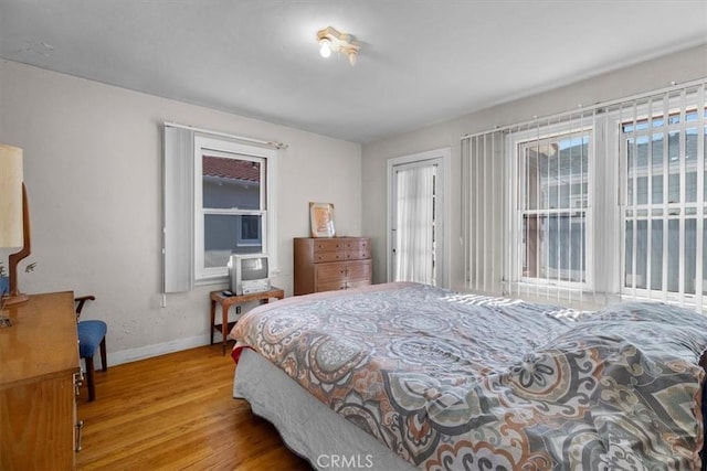 308 Catalina Ave, Avalon, CA 90704 - bedroom featuring baseboards and wood finished floors