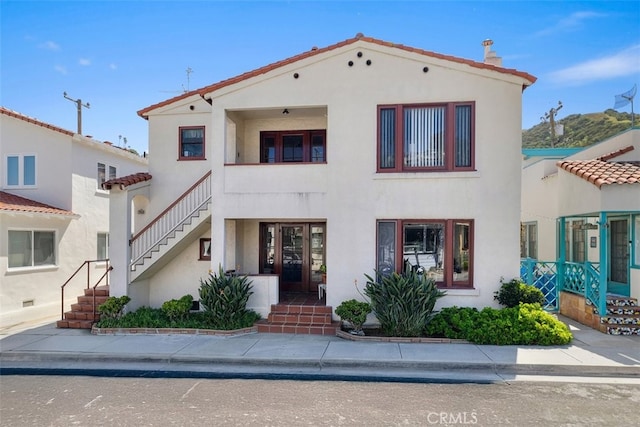 308 Catalina Ave, Avalon, CA 90704 - mediterranean / spanish house with stucco siding and a tiled roof