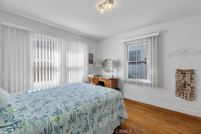 308 Catalina Ave, Avalon, CA 90704 - bedroom featuring baseboards and wood finished floors