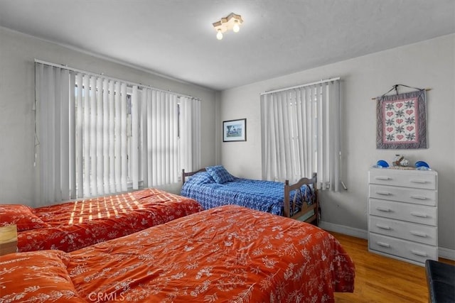 308 Catalina Ave, Avalon, CA 90704 - bedroom featuring baseboards and wood finished floors