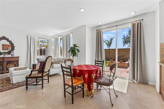 27669 Bluff Vista Way, Menifee, CA 92584 - dining area featuring light tile patterned floors and recessed lighting