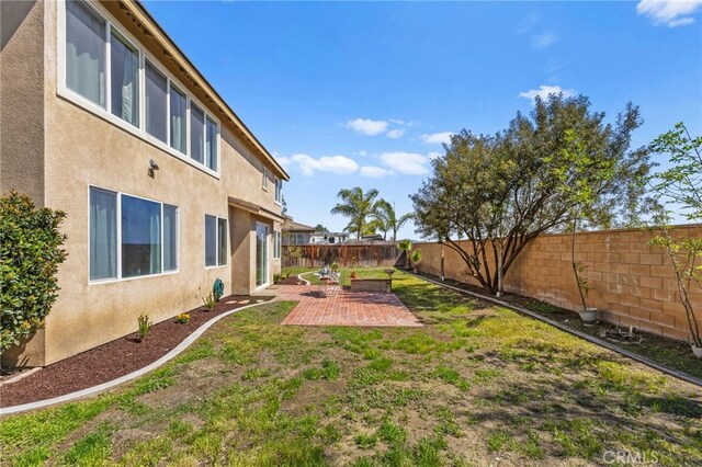 27669 Bluff Vista Way, Menifee, CA 92584 - view of yard with a patio and a fenced backyard