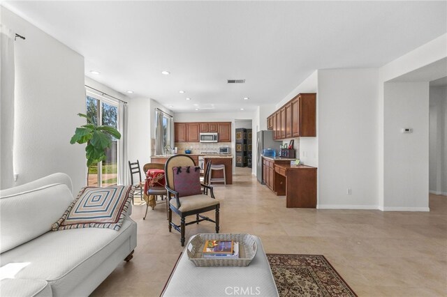27669 Bluff Vista Way, Menifee, CA 92584 - living area featuring recessed lighting, visible vents, and baseboards