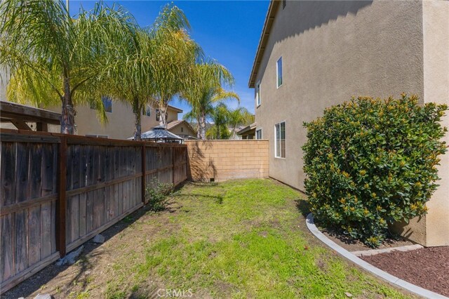 27669 Bluff Vista Way, Menifee, CA 92584 - view of yard featuring a fenced backyard