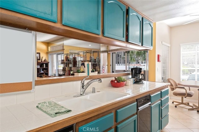4591 Warner Ave Unit 101, Huntington Beach, CA 92649 - bar area featuring a sink and light tile patterned floors