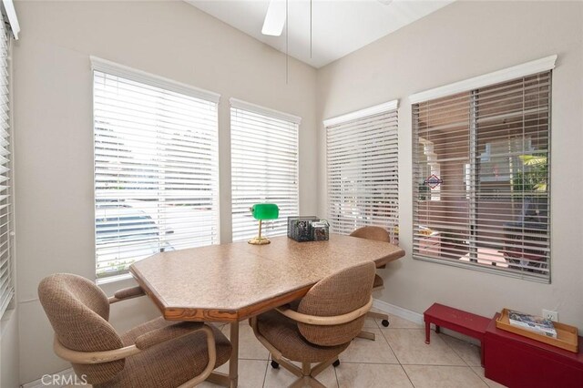 4591 Warner Ave Unit 101, Huntington Beach, CA 92649 - tiled dining area with ceiling fan and a desk