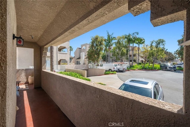4591 Warner Ave Unit 101, Huntington Beach, CA 92649 - balcony featuring a residential view