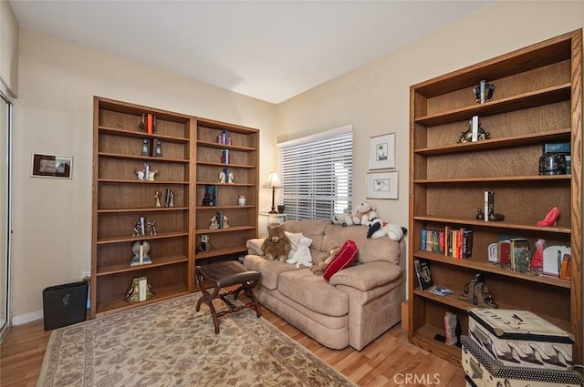 4591 Warner Ave Unit 101, Huntington Beach, CA 92649 - sitting room featuring wood finished floors