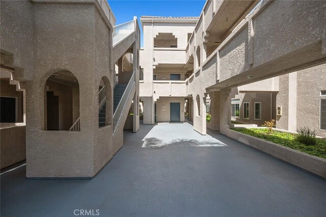exterior space with aphalt driveway