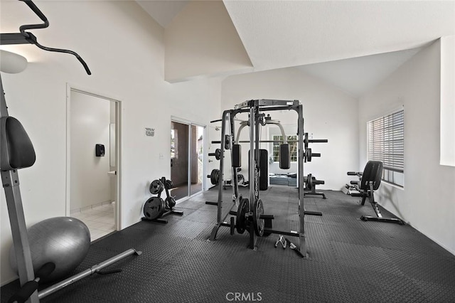 4591 Warner Ave Unit 101, Huntington Beach, CA 92649 - workout room featuring vaulted ceiling