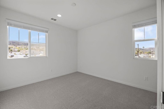 8624 Amherst St, Santee, CA 92071 - carpeted spare room featuring visible vents, recessed lighting, and baseboards