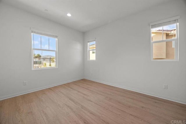 8624 Amherst St, Santee, CA 92071 - spare room featuring recessed lighting, baseboards, and wood finished floors