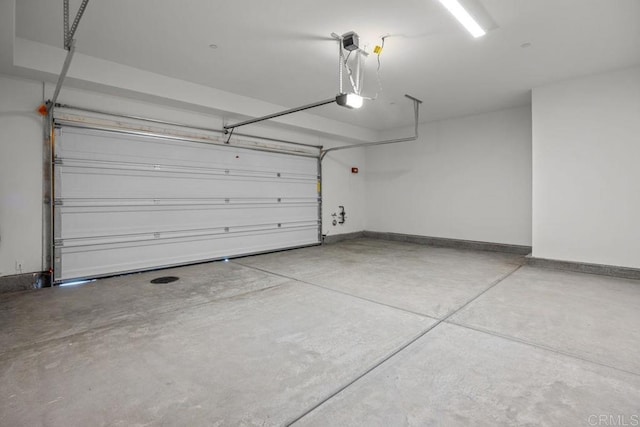 8624 Amherst St, Santee, CA 92071 - garage with a garage door opener and baseboards