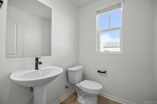 8624 Amherst St, Santee, CA 92071 - bathroom with toilet, baseboards, and wood finished floors