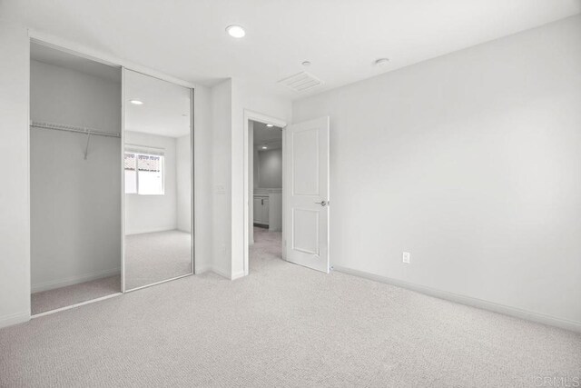 8624 Amherst St, Santee, CA 92071 - unfurnished bedroom with carpet, a closet, and baseboards