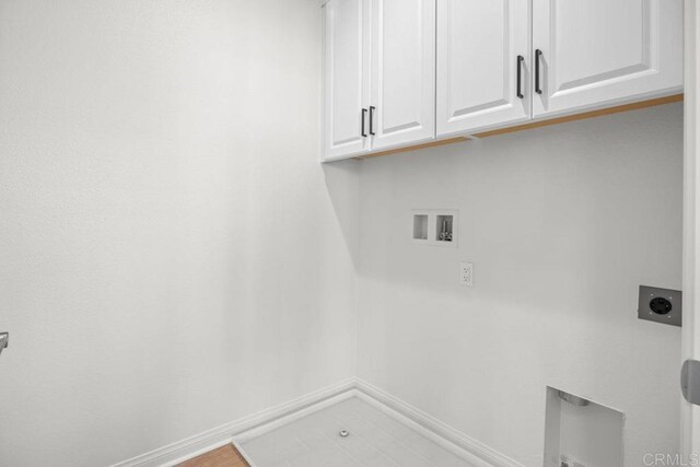 8624 Amherst St, Santee, CA 92071 - washroom with cabinet space, electric dryer hookup, baseboards, and washer hookup