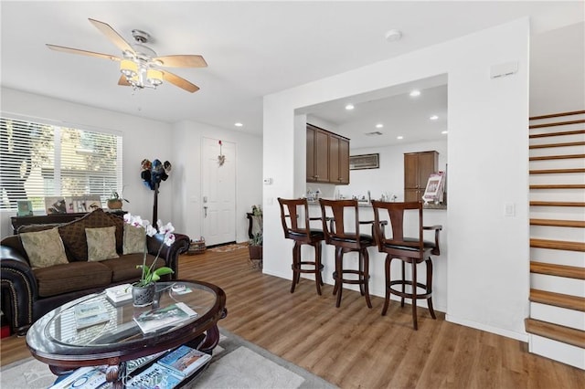 27571 Darrington Ave Unit 2, Murrieta, CA 92562 - living area with stairs, wood finished floors, recessed lighting, and a ceiling fan
