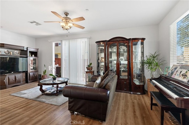 27571 Darrington Ave Unit 2, Murrieta, CA 92562 - living room featuring wood finished floors and a ceiling fan