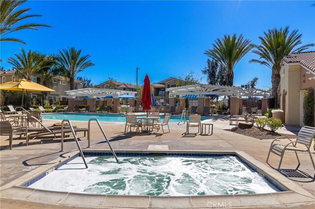 27571 Darrington Ave Unit 2, Murrieta, CA 92562 - community pool featuring a pergola, a community hot tub, and a patio