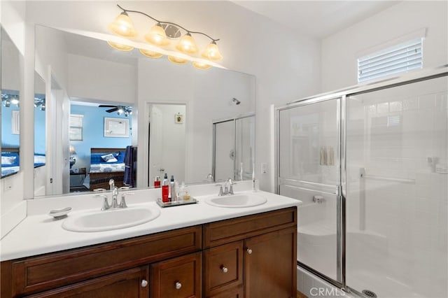 27571 Darrington Ave Unit 2, Murrieta, CA 92562 - ensuite bathroom with a stall shower, double vanity, ceiling fan, and healthy amount of natural light