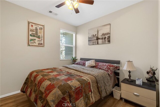 27571 Darrington Ave Unit 2, Murrieta, CA 92562 - bedroom with wood finished floors and ceiling fan