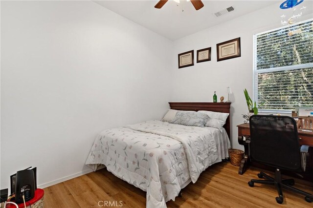 27571 Darrington Ave Unit 2, Murrieta, CA 92562 - bedroom with wood finished floors and a ceiling fan