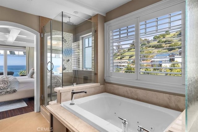 133 Upper Terrace Rd, Avalon, CA 90704 - full bath featuring a jetted tub, plenty of natural light, a stall shower, and ensuite bathroom