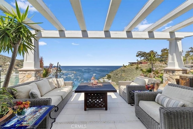 133 Upper Terrace Rd, Avalon, CA 90704 - view of patio with a water view, an outdoor living space with a fire pit, and a pergola