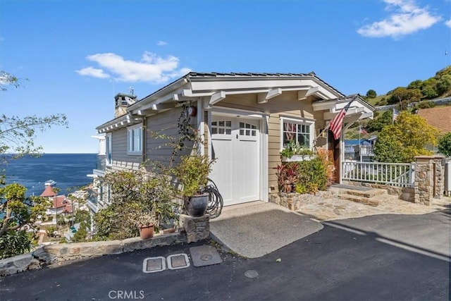 133 Upper Terrace Rd, Avalon, CA 90704 - exterior space with a chimney