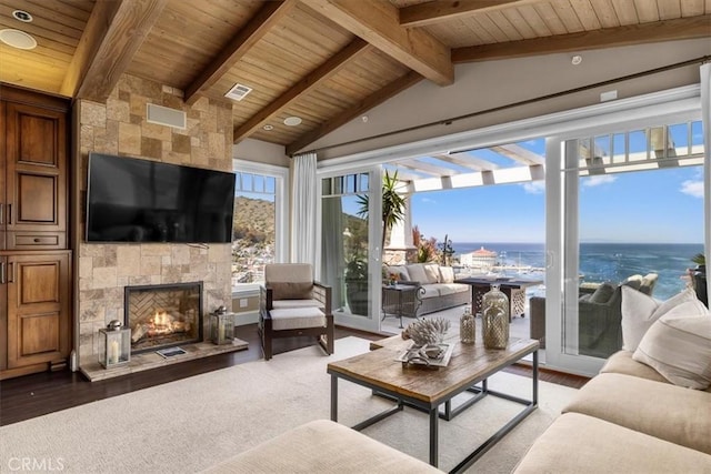 133 Upper Terrace Rd, Avalon, CA 90704 - living room with visible vents, vaulted ceiling with beams, wood ceiling, a fireplace, and wood finished floors