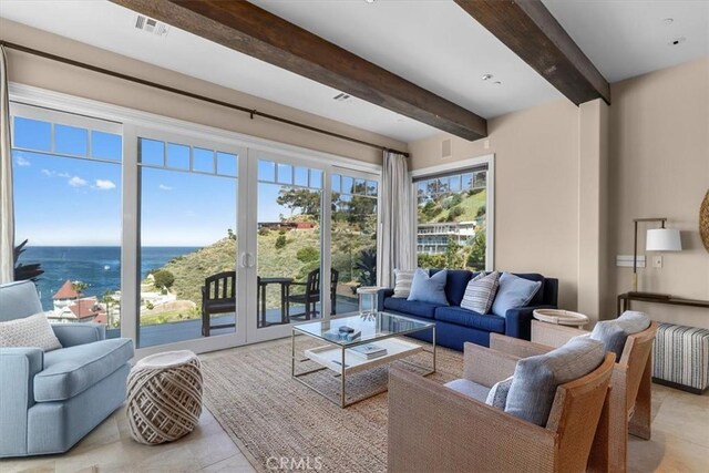 133 Upper Terrace Rd, Avalon, CA 90704 - living room with beamed ceiling, a water view, and visible vents