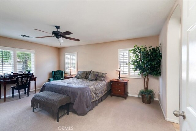 26718 Cactus Creek Way, Menifee, CA 92586 - carpeted bedroom with multiple windows, baseboards, and a ceiling fan
