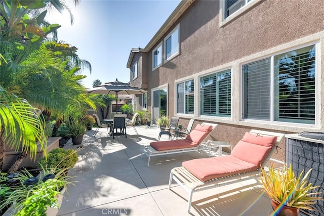 26718 Cactus Creek Way, Menifee, CA 92586 - view of patio / terrace featuring outdoor dining space and central AC