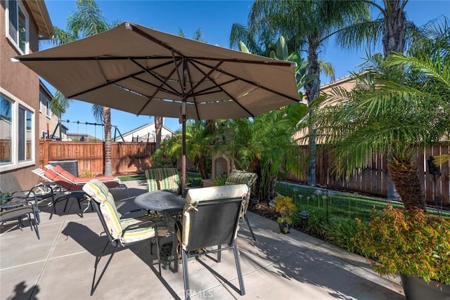 26718 Cactus Creek Way, Menifee, CA 92586 - fenced backyard featuring outdoor dining space and a patio