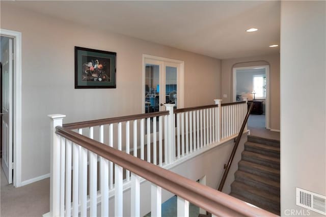 26718 Cactus Creek Way, Menifee, CA 92586 - hallway with an upstairs landing, carpet floors, recessed lighting, baseboards, and french doors
