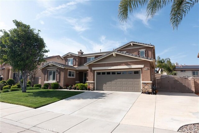 26718 Cactus Creek Way, Menifee, CA 92586 - craftsman-style home featuring stone siding, a gate, driveway, and stucco siding