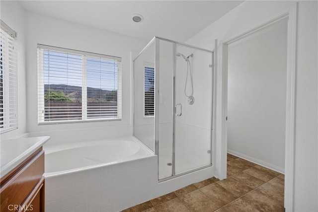 34135 Crenshaw St, Beaumont, CA 92223 - bathroom with a bath, a stall shower, and vanity