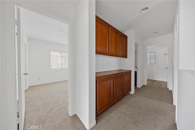34135 Crenshaw St, Beaumont, CA 92223 - hallway featuring light colored carpet and baseboards