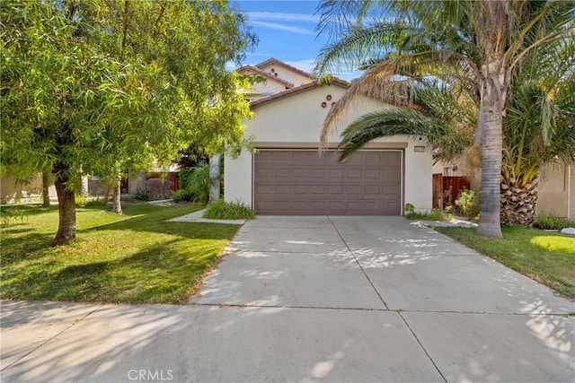 34135 Crenshaw St, Beaumont, CA 92223 - view of front facade with driveway, an attached garage, stucco siding, and a front yard