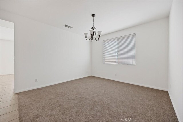 34135 Crenshaw St, Beaumont, CA 92223 - carpeted spare room with a chandelier and baseboards