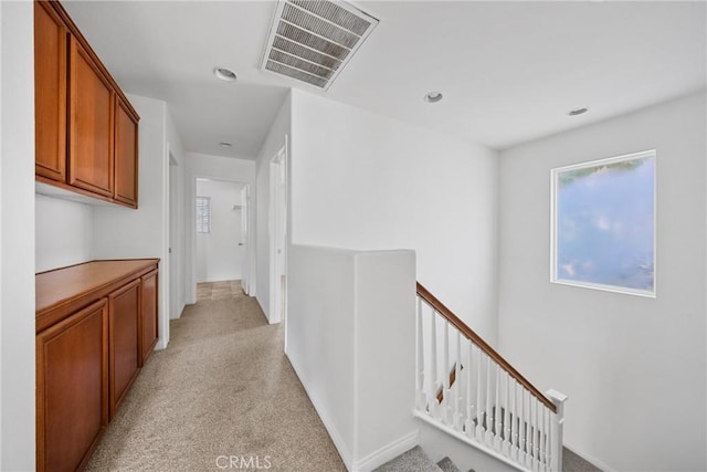 34135 Crenshaw St, Beaumont, CA 92223 - hallway featuring an upstairs landing, light colored carpet, and recessed lighting