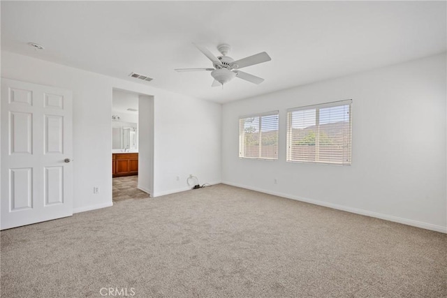 34135 Crenshaw St, Beaumont, CA 92223 - unfurnished bedroom with carpet flooring, a ceiling fan, and ensuite bath