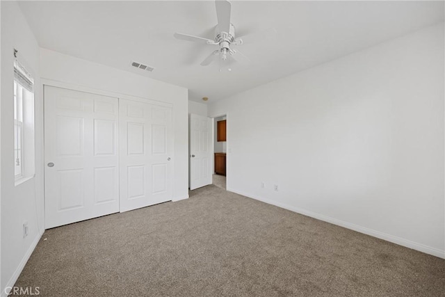 34135 Crenshaw St, Beaumont, CA 92223 - unfurnished bedroom with carpet, a closet, and ceiling fan