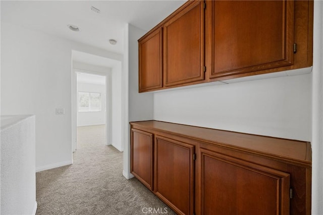 34135 Crenshaw St, Beaumont, CA 92223 - hallway with light carpet and baseboards