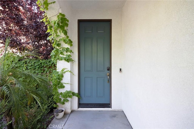 34135 Crenshaw St, Beaumont, CA 92223 - doorway to property with stucco siding