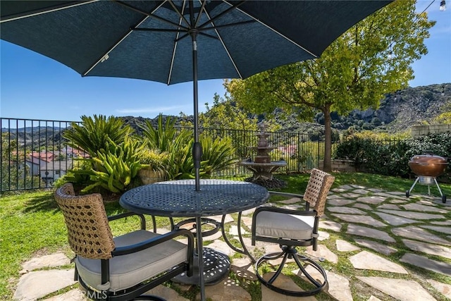 25908 Coleridge Pl, Stevenson Ranch, CA 91381 - view of patio / terrace with outdoor dining space, a mountain view, and area for grilling