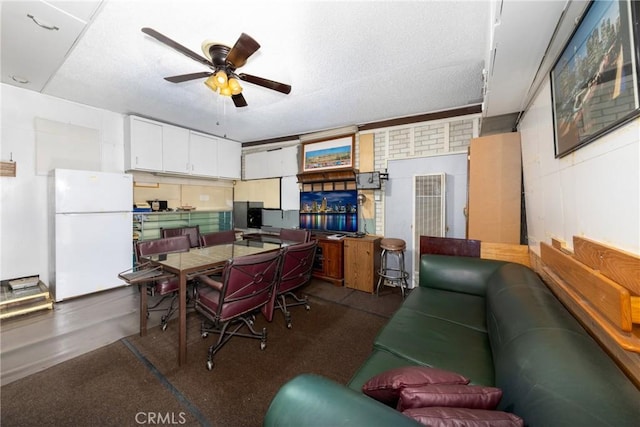 dining room with a ceiling fan